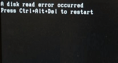 电脑提示a disk read error occurred错误 怎么解决